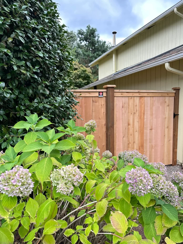 Custom cedar automatic gate installation in Seattle by DH Fence Pros