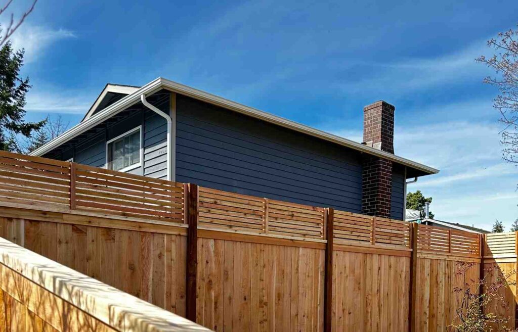 licensed fence contractor installed horizontal cedar fence with lattice panels Seattle backyard