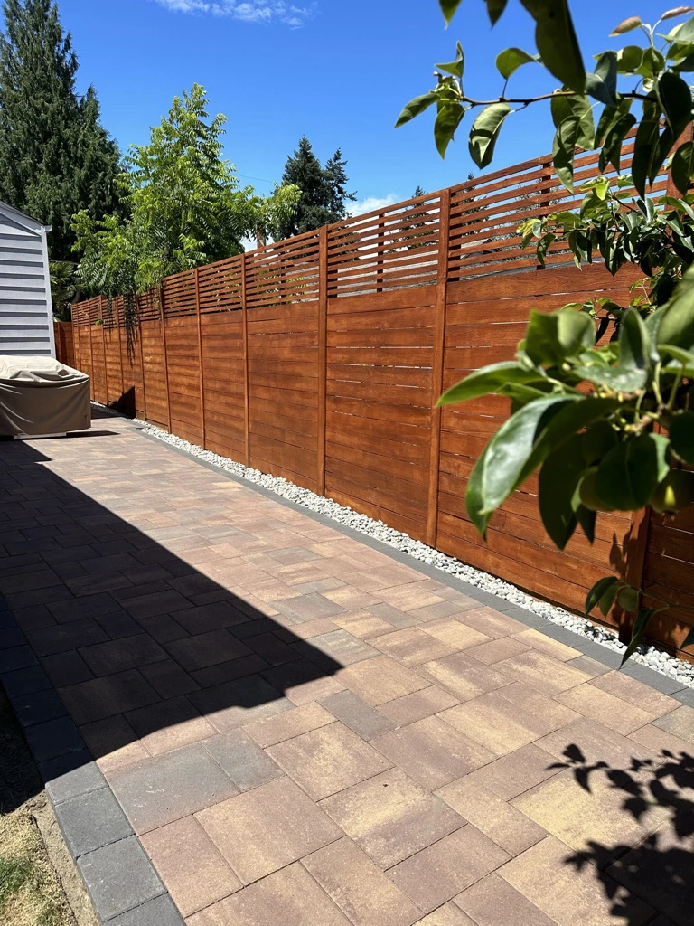 Horizontal cedar fence installation in Greenwood homes