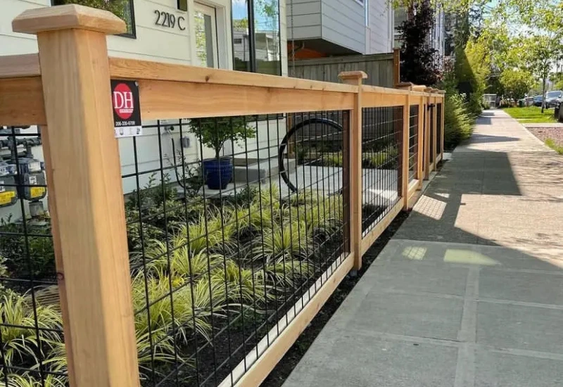 hogwire fence installation on a Sand Point home