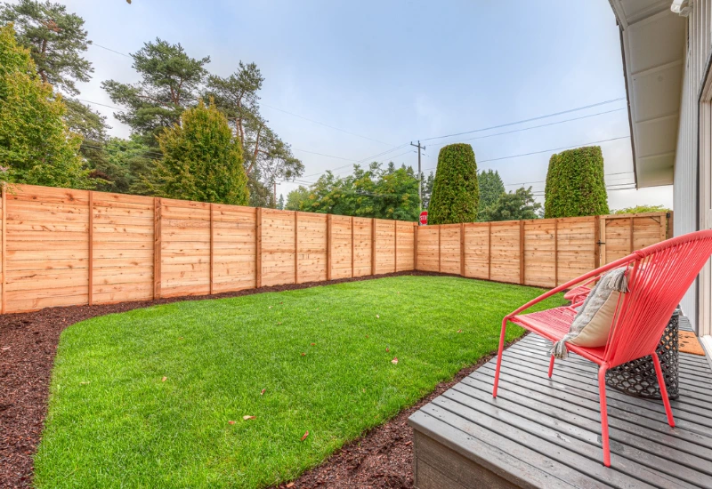 Horizontal cedar fence installed in a residential backyard in Bellevue, WA