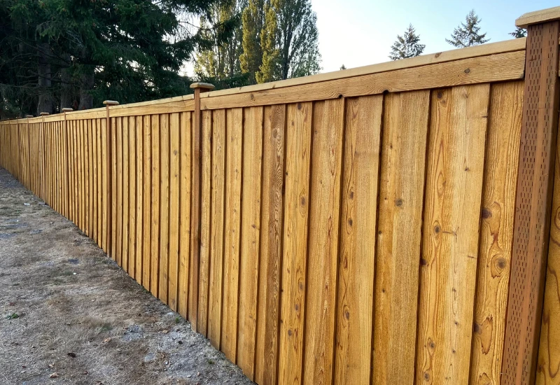 Privacy cedar fence installed along a residential property in Mercer Island, WA