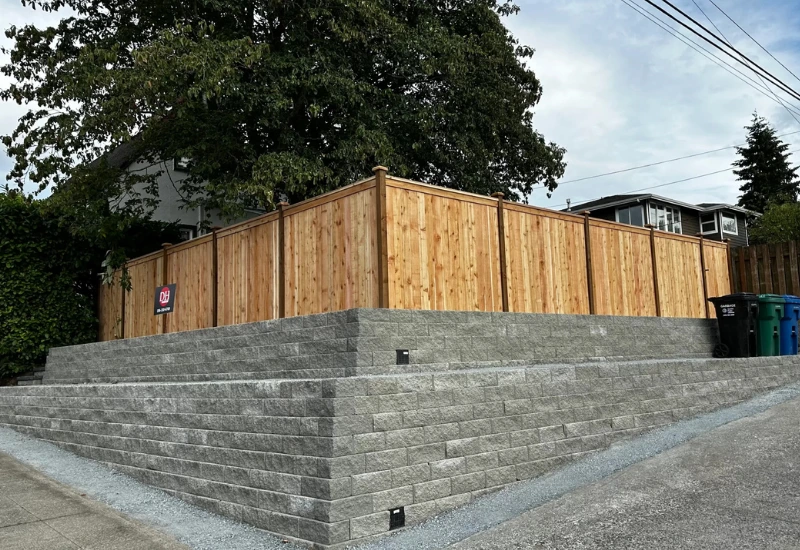 retaining wall and cedar fence installation on a Maple Leaf property