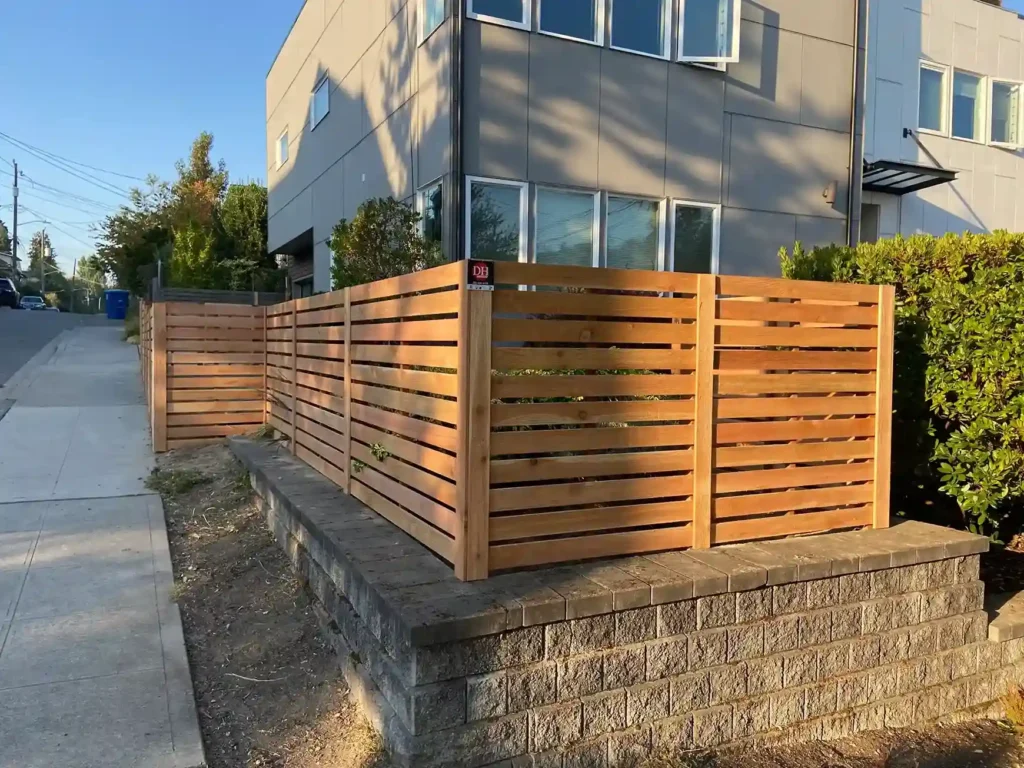 retaining wall and cedar fence installation on a Burien property