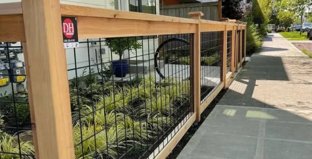 Hogwire fence with cedar frame installed in Seattle