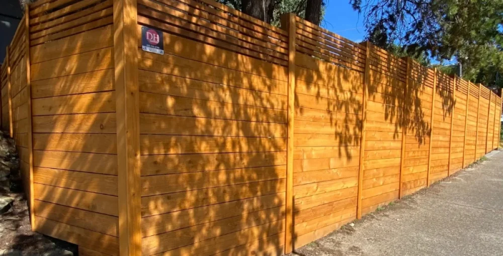 Horizontal cedar fence installation in Seattle with modern design